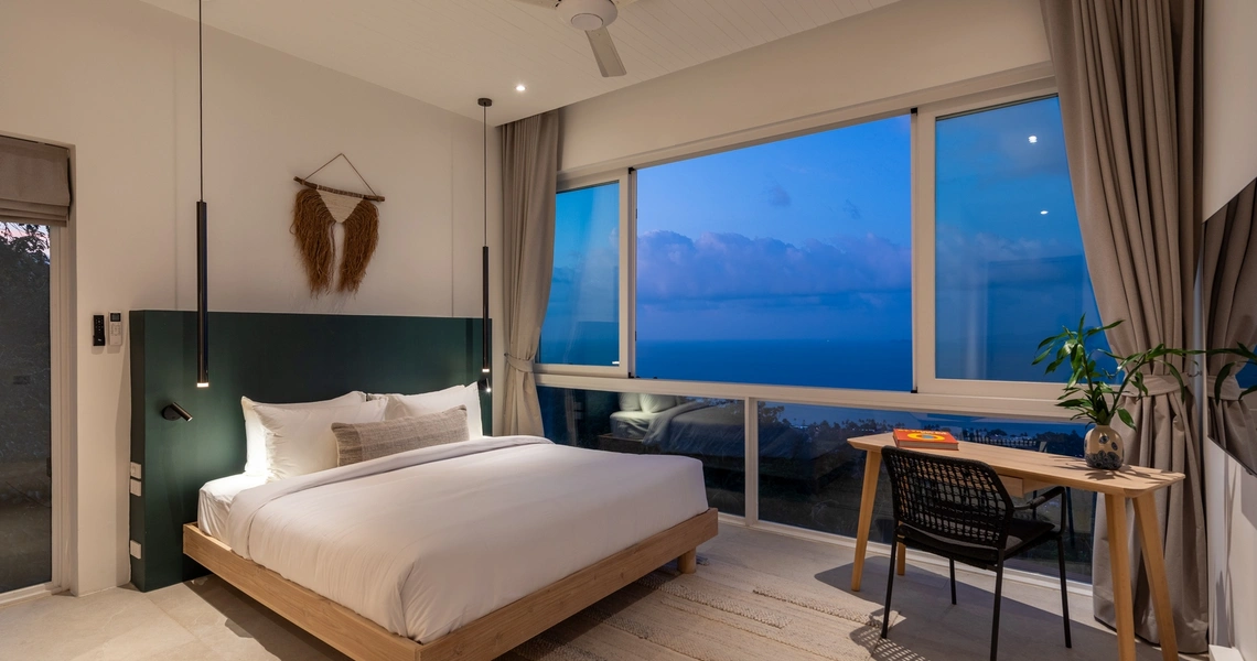 Pacific Palisade Samui luxury villa - bedroom and sea view at night