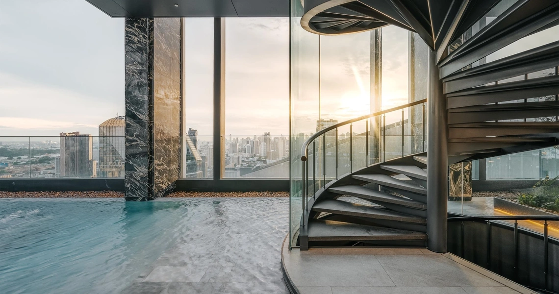 Hyde Heritage Thonglor Bangkok luxury condo - spiral staircase and swimming pool