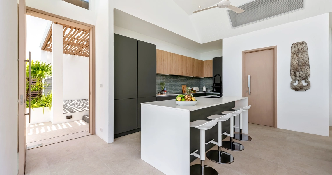 Pacific Palisade Samui luxury villa - kitchen and bar stools