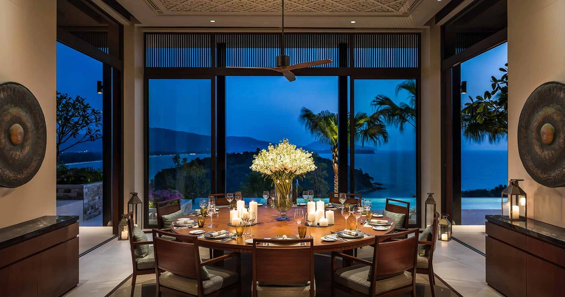 Layan Residences by Anantara luxury villa dining area at night