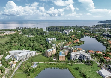 Laguna Aster Phuket luxury condo - aerial view of condo, lakes and sea