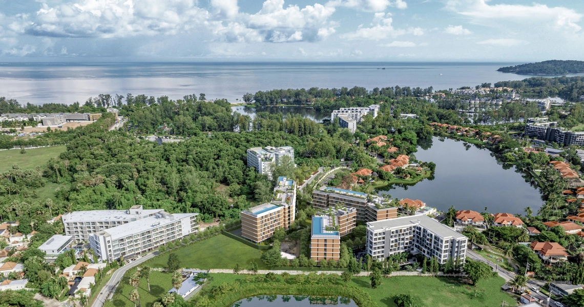 Laguna Aster Phuket luxury condo - aerial view of condo, lakes and sea